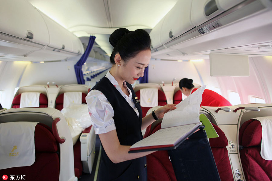 World's most beautiful stewardess: Serving passengers with smile