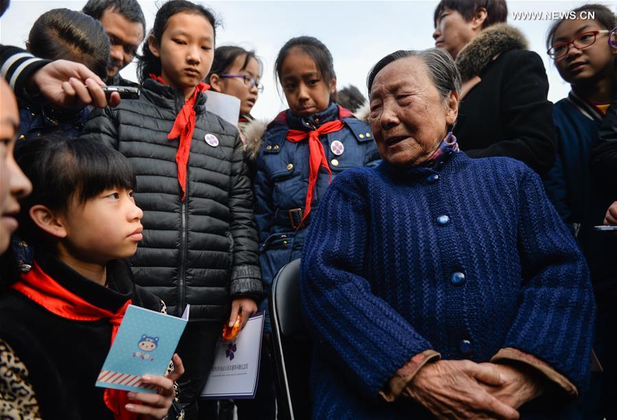 People mourn family members ahead of National Memorial Day for Nanjing Massacre Victims