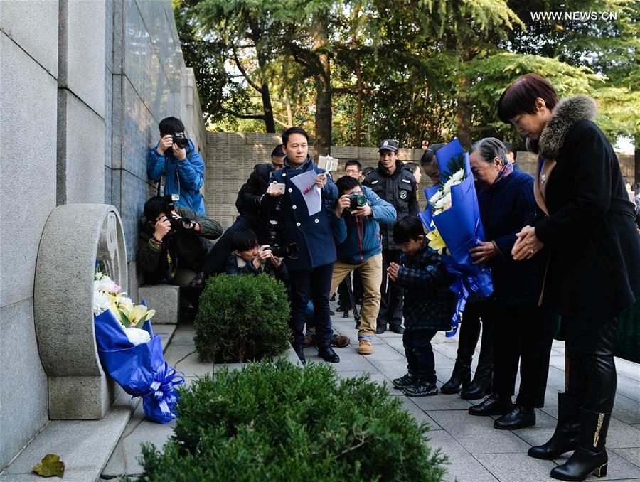 People mourn family members ahead of National Memorial Day for Nanjing Massacre Victims