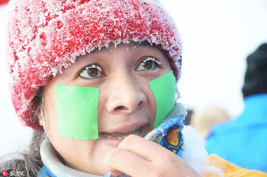 Hair, eyelashes turn white as temperature falls to minus 30 in Heilongjiang