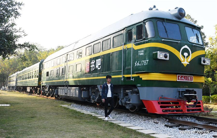 Retired green train transforms into 24-hour book bar