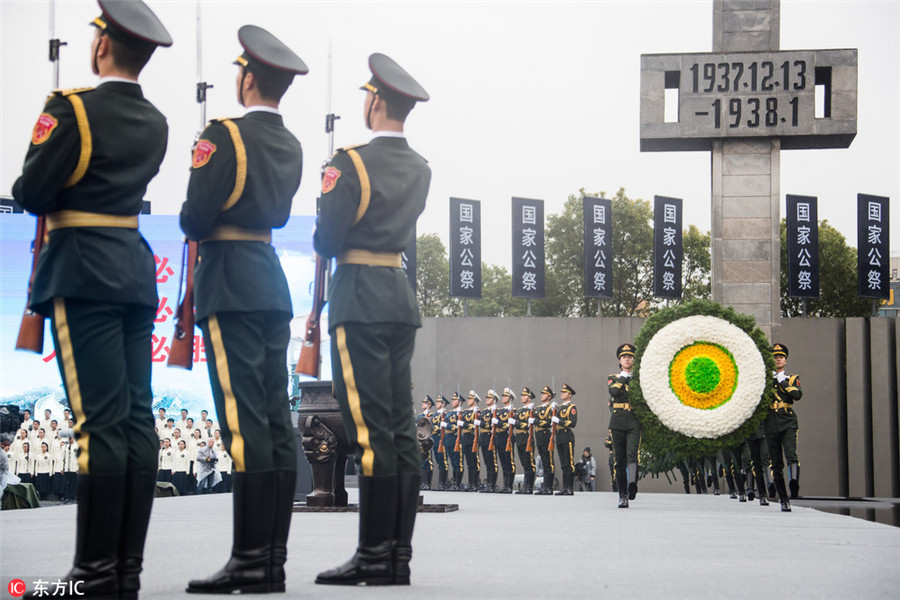 Thousands pay tribute to victims of Nanjing Massacre