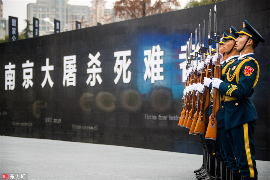 Thousands pay tribute to victims of Nanjing Massacre