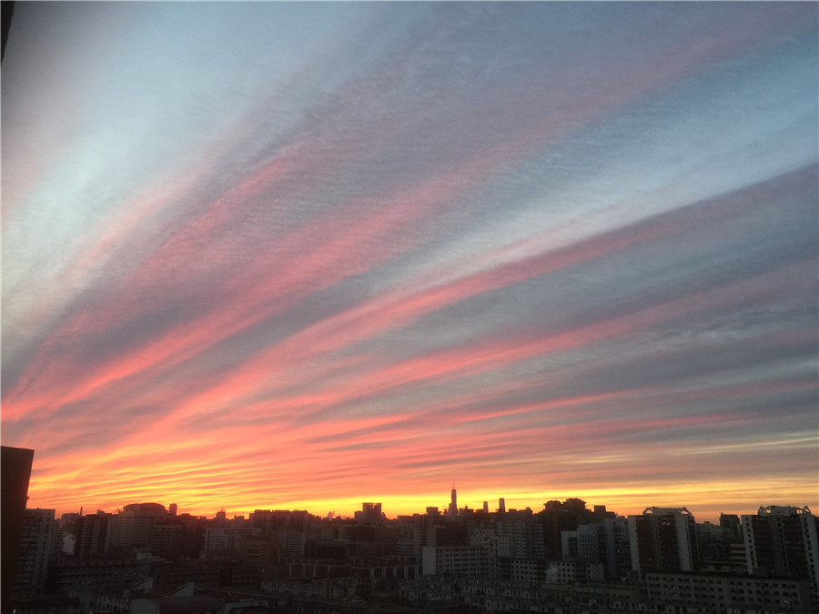 Beijing wakes to rosy dawn