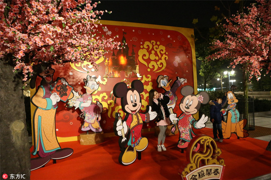 Mickey and Minnie get into Spring Festival spirit in Shanghai