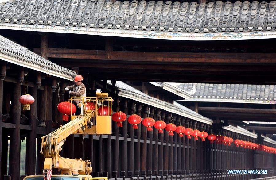 People across China greet upcoming Spring Festival