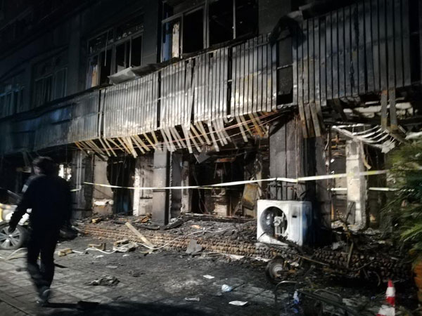 18 killed, 2 injured in massage parlor fire