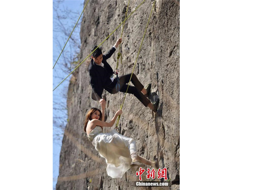 Taking love to new heights with special cliffside wedding photo