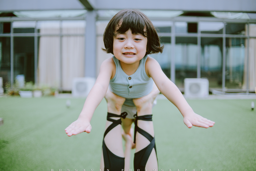 Little yogi practices yoga with 'guru' mother