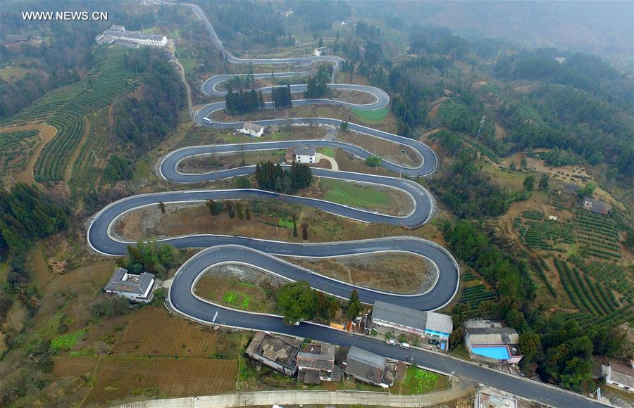 Winding road looks like jade belt around mountain in Central China