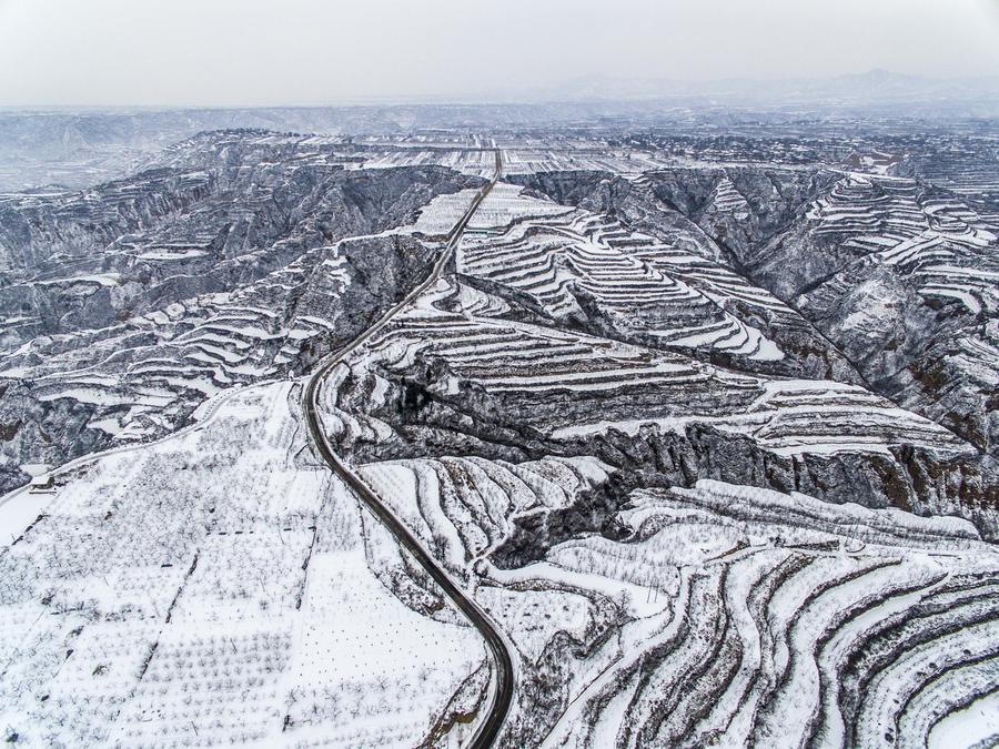 Scenery of snow-covered terrace fields in N China