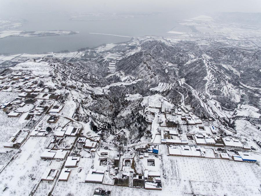 Scenery of snow-covered terrace fields in N China