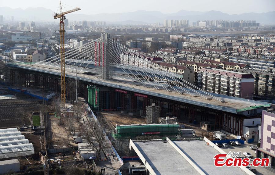 World's longest single axis bridge swings into place