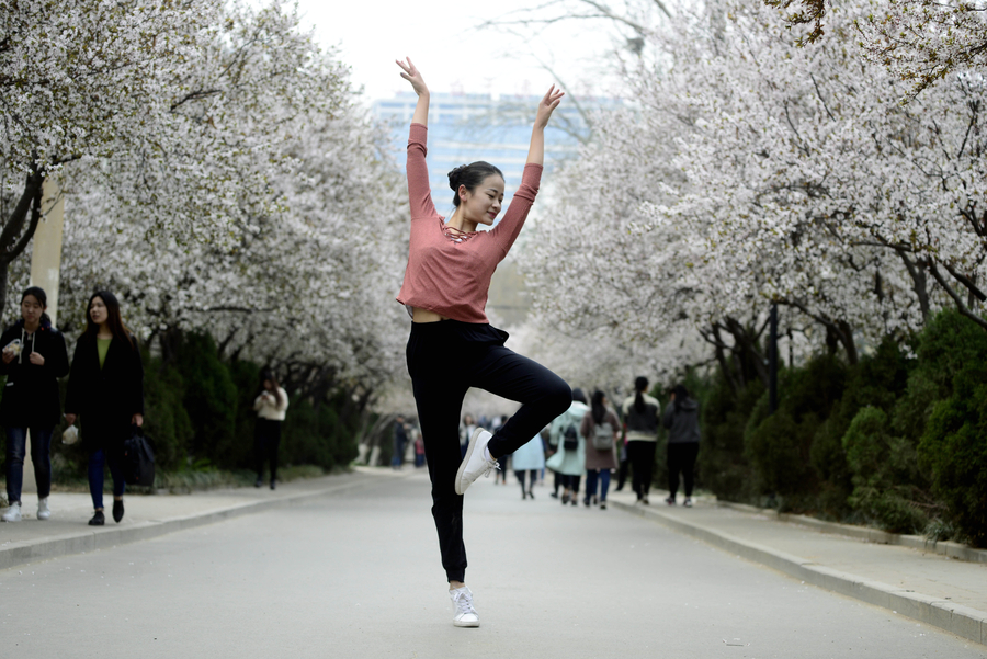 Dancing amid sea of flowers in E China