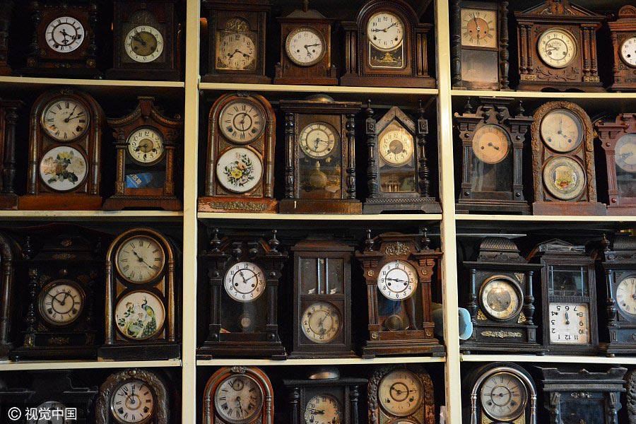 Thousands of clocks decorate old couple's home in Northeast China