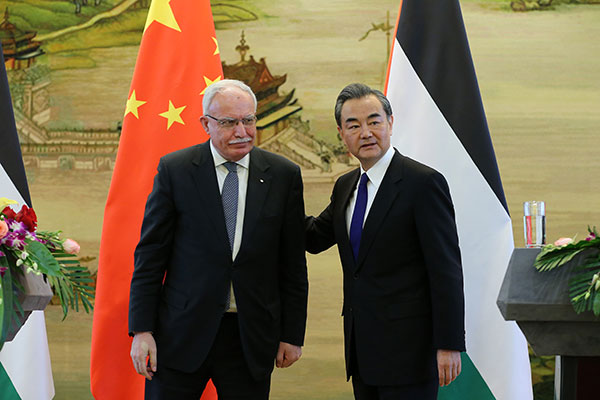 Wang meets Palestine's foreign minister, affirms support for a two-state solution