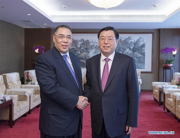 China's top legislator hears briefing by Macao SAR officials