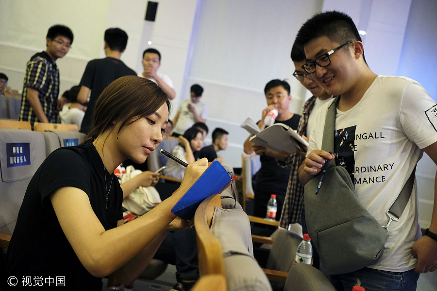 What do top <EM>gaokao</EM> scorers do after university graduation?