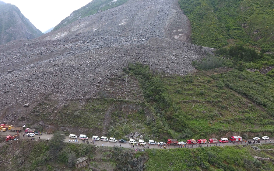 Xi urges all-out rescue effort after landslide buries 62 homes