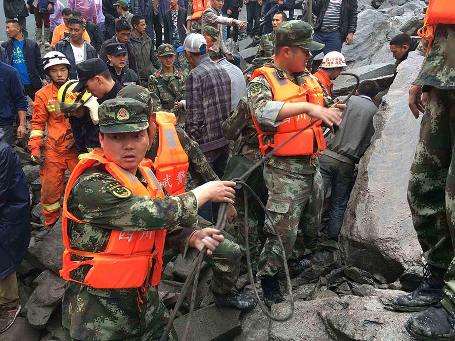 Xi urges all-out rescue effort after landslide buries 62 homes