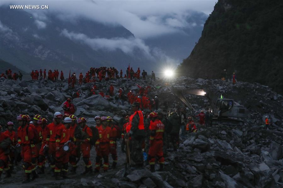 Rescue work underway after SW China's devastated landslide