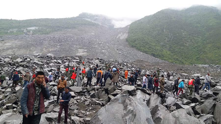 Xi urges all-out rescue effort after landslide buries 62 homes