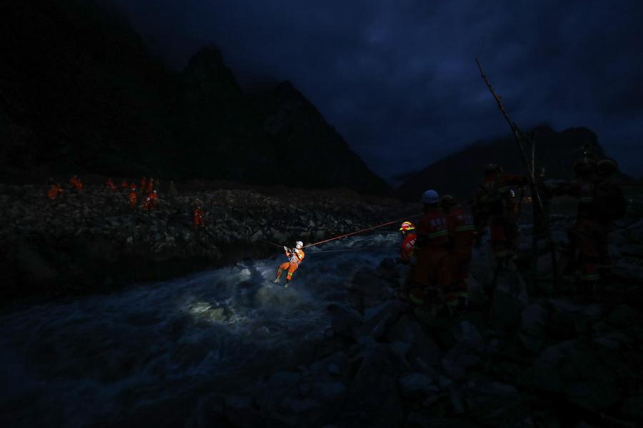 Massive rescue effort after SW China's devastating landslide