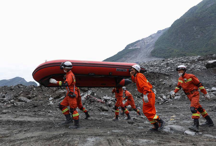 Massive rescue effort after SW China's devastating landslide