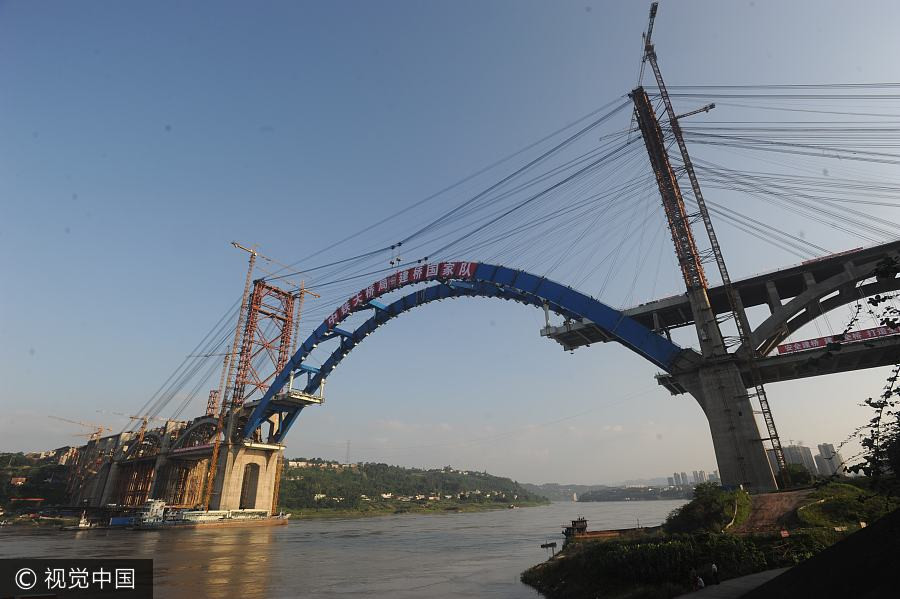 China inches closer to completing world's first 'rail above road bridge'