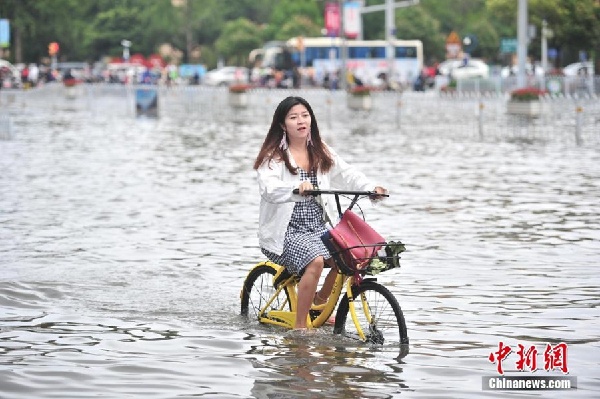 Heavy rains submerge Kunming
