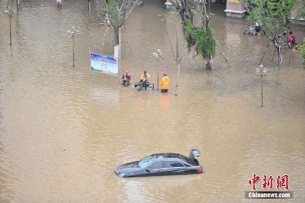 Heavy rains submerge Kunming