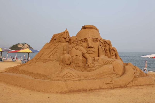 Beach goers impressed by sand sculptures