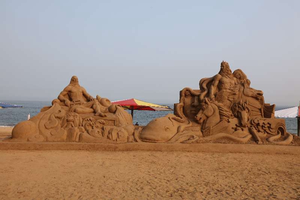 Beach goers impressed by sand sculptures