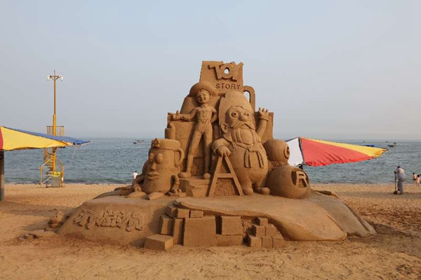 Beach goers impressed by sand sculptures