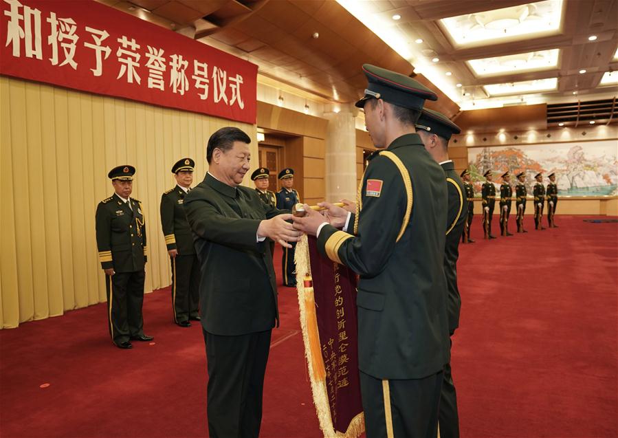 Xi honors military officers, unit ahead of Army Day