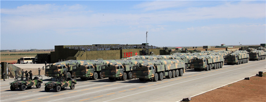 Xi inspects troops as China's military might on show