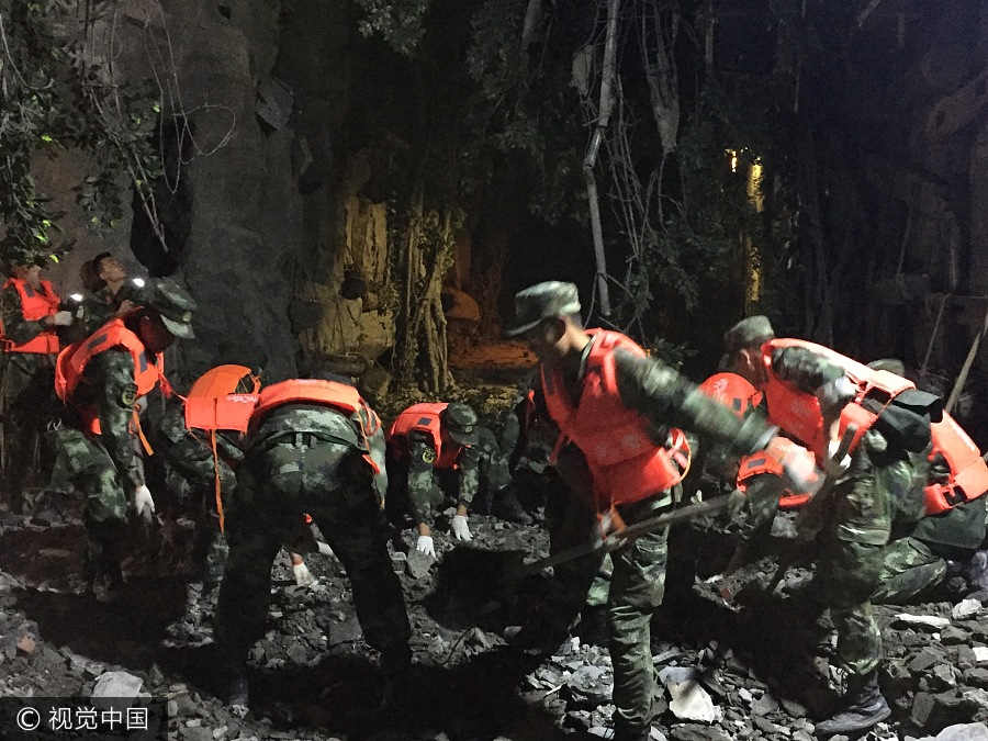 Rescuers work overnight to save quake victims