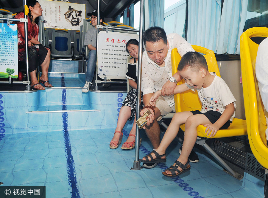 Refreshing journey: Bus turned into 'swimming pool'