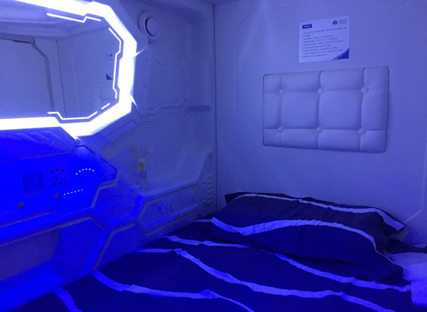 Smart unmanned capsule hotel opens in Chongqing