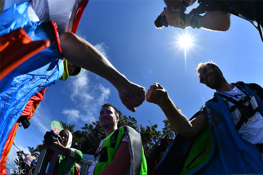 Wingsuit flying championship kicks off in Hunan