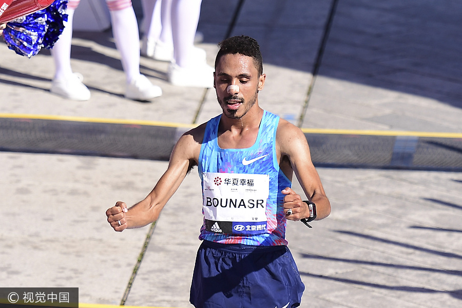 Runners compete during 2017 Beijing Marathon