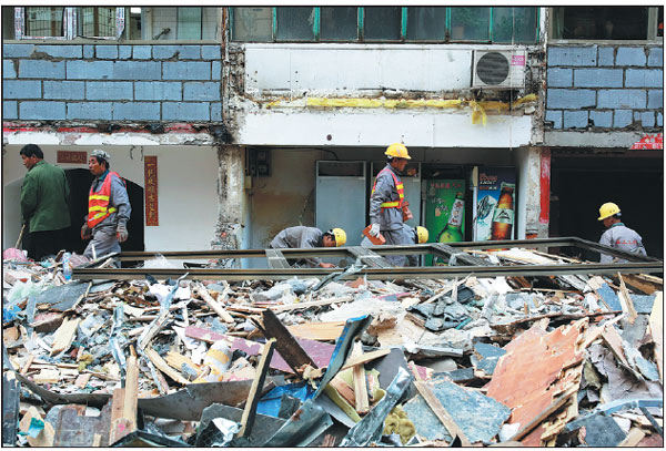 Work begins to clean up Beijing's 'dirty streets'