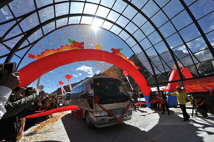 World's highest highway tunnel opens in SW China