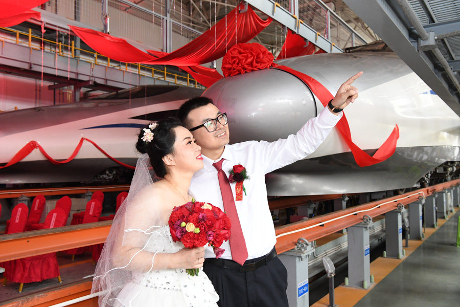 Couples start new journey at bullet train maintenance center