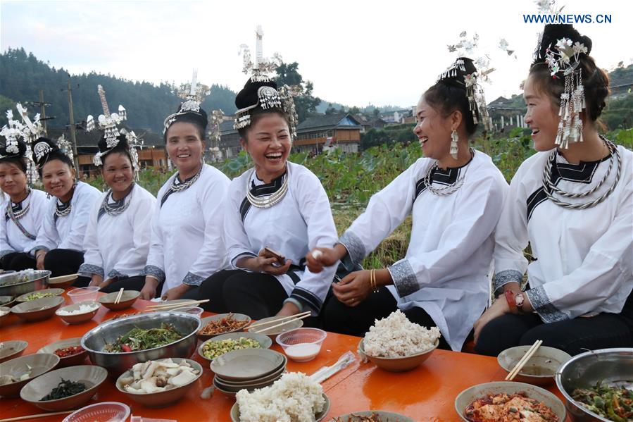 People find various ways to spend National Day holidays