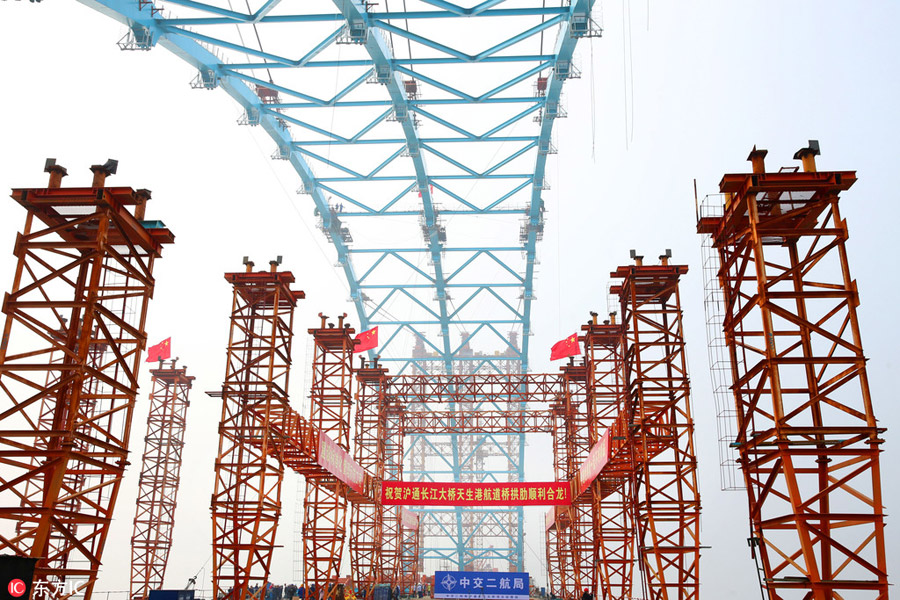 Arch of world's longest cable-stayed bridge joined