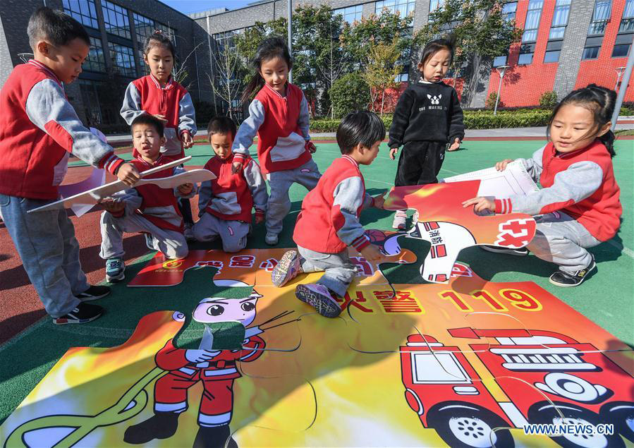 Children attend fire-fighting educational activity in E China