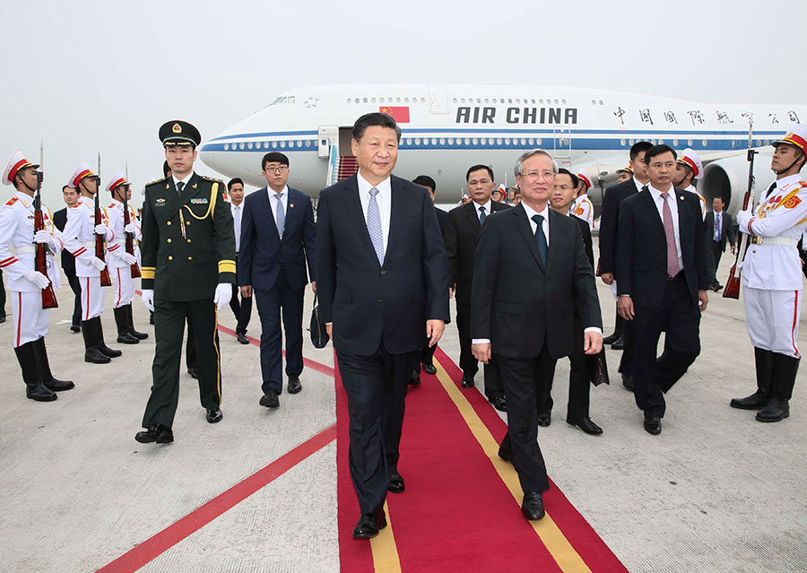 Xi arrives in Hanoi for state visit