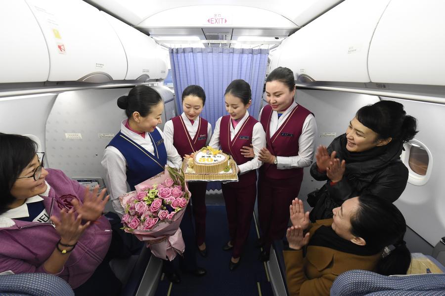 Daughter succeeds mother as flight attendant in China Southern Airlines