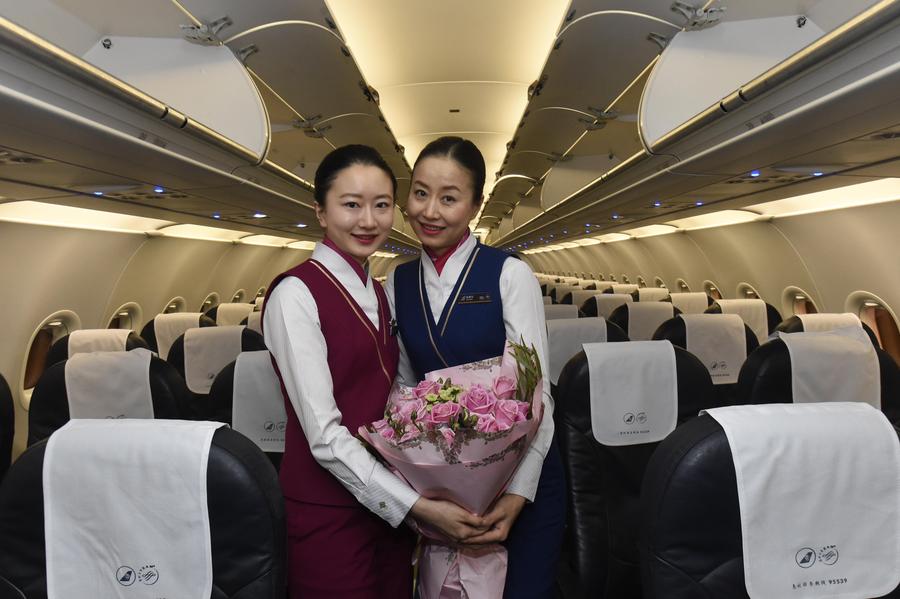 Daughter succeeds mother as flight attendant in China Southern Airlines